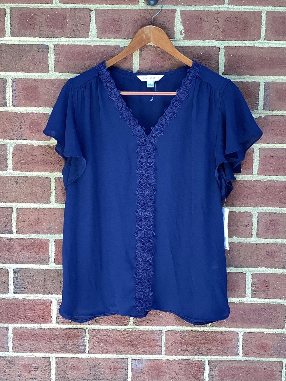NWT Counterparts Navy Flutter Sleeve Blouse Floral Crochet Trim L